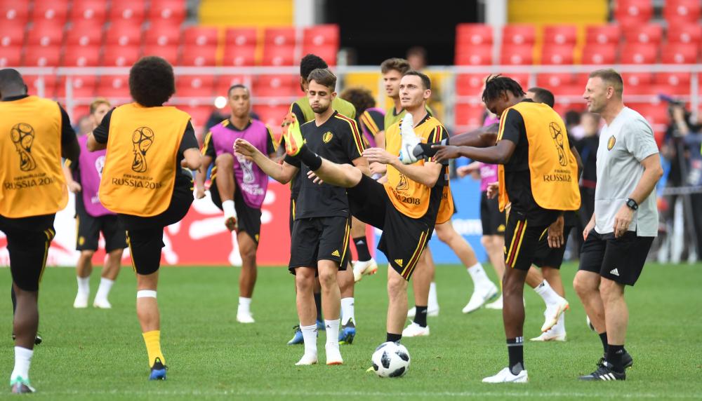 Belgium’s players warm up during a training session at the Spartak Stadium in Moscow Friday. — AFP 