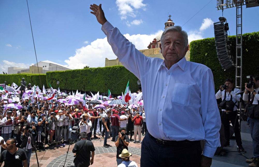 Mexican presidential candidate for the MORENA party, Andres Manuel Lopez Obrador is pictured during a campaign rally in Queretaro, state of Queretaro, Mexico, on Sunday. — AFP