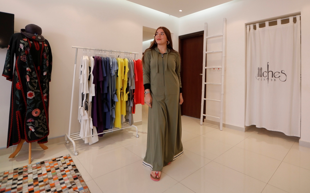 Eman Joharjy reacts as she is about to drive to Jeddah's Corniche to cycle.