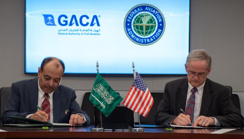 GACA President Abdulhakim Al-Tamimi, left, and Deputy Administrator of FAA Carl E. Burleson signing the MoU in Washington. 