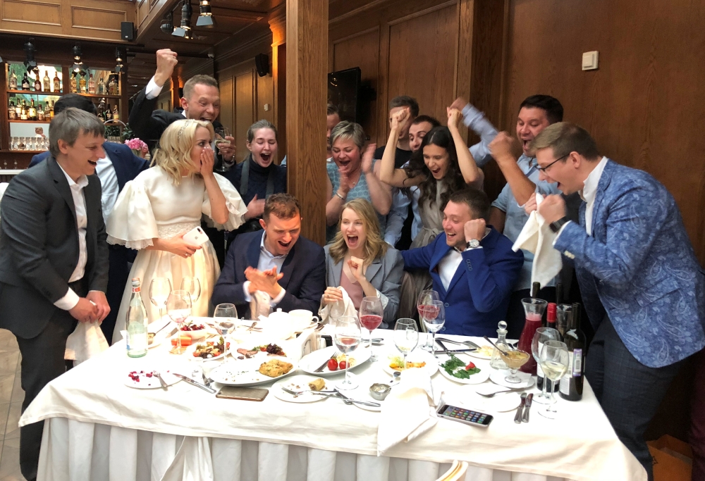 Participants of a wedding ceremony celebrate the victory of Russia over Spain in their soccer World Cup Round of 16 match, in the town of Pushkin outside St Petersburg, Russia on Sunday. - Reuters
