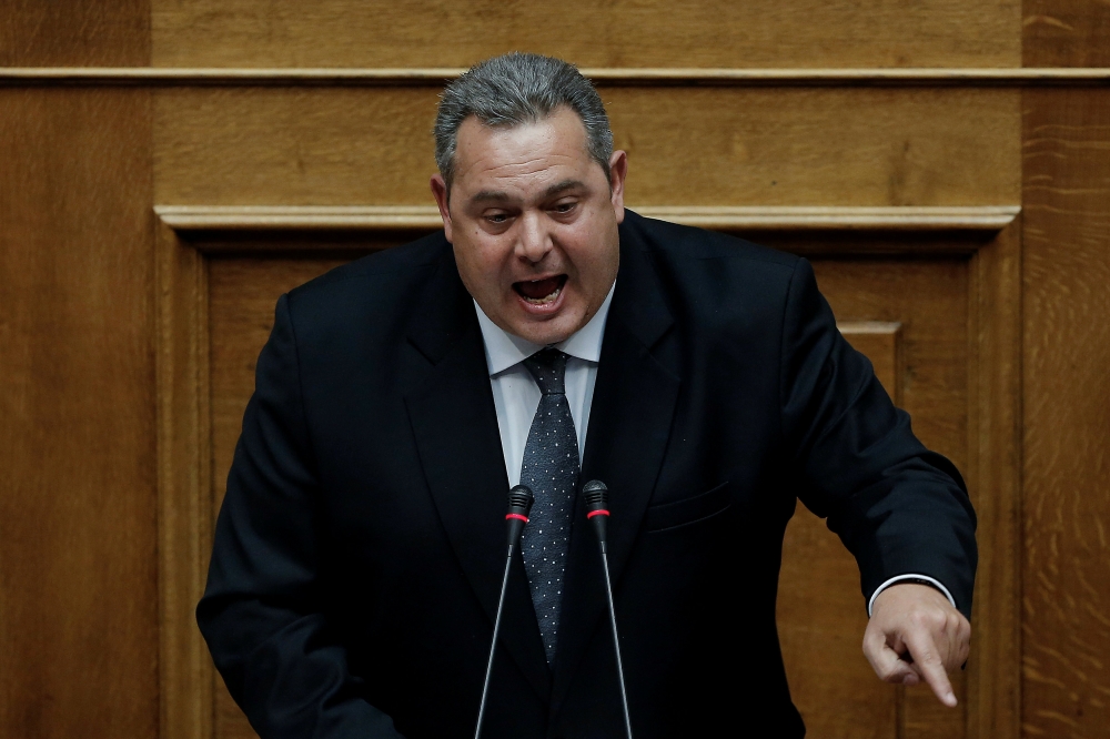 Greek Defense Minister and leader of minor coalition party Independent Greeks Panos Kammenos addresses lawmakers during a parliamentary session in Athens, Greece, in this Nov. 27, 2017 file photo. — Reuters