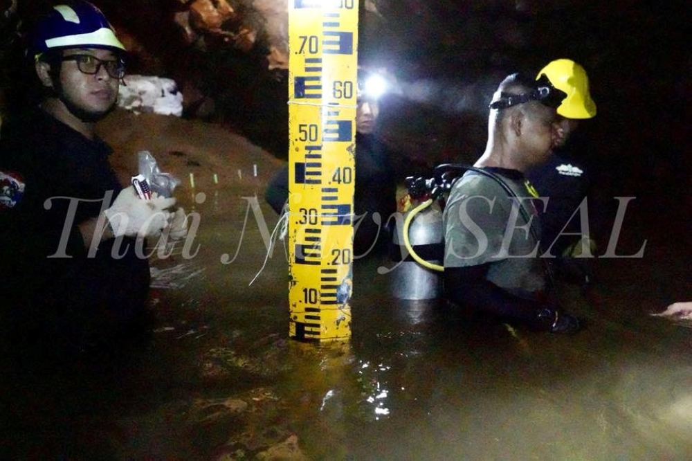 Rescue personnel work at the Tham Luang cave complex, as members of an under-16 soccer team and their coach have been found alive according to local media, in the northern province of Chiang Rai, Thailand, on Wednesday. — Reuters