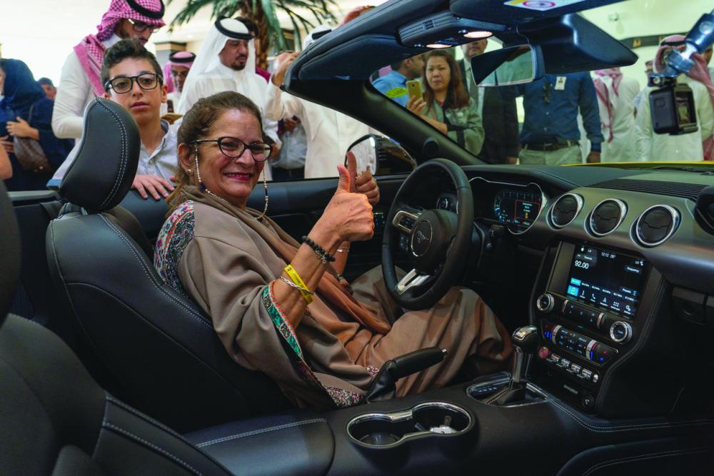 Sahar Hasan Nasif behind the wheel of her dream car 2018 Ford Mustang GT convertible