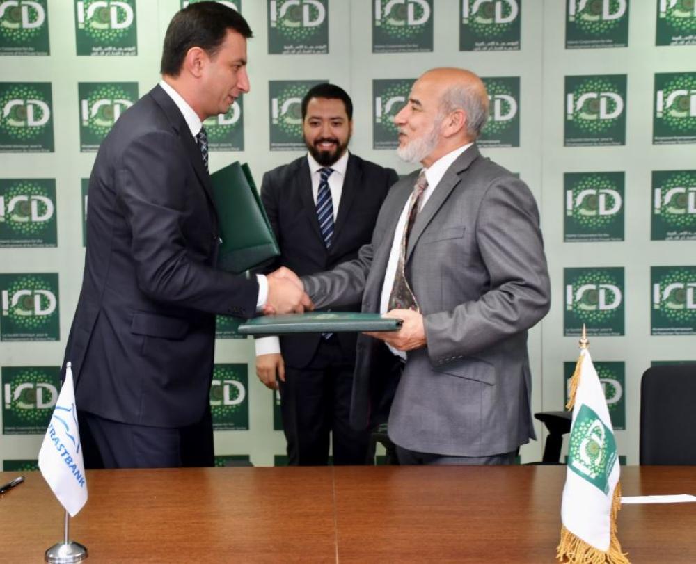 The Acting Chief Executive Officer of the Islamic Corporation for the Development of the Private sector (ICD) Najmul Hassan and the Chairman of the Management Board of the Private Joint-Stock Trustbank (Trustbank) Sardor Normukhamedov sign  a line of financing agreement at the ICD’s head office in Jeddah on Tuesday

