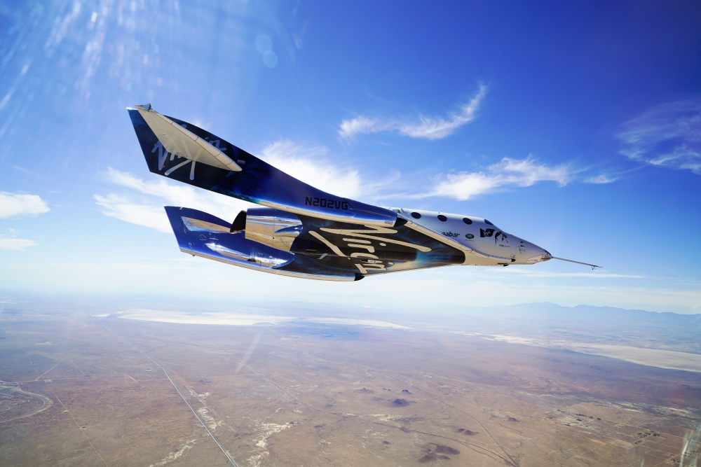 This handout photograph obtained courtesy of Blue Origin in an undisclosed date and place shows the New Shepard booster. The two companies leading the pack in the pursuit of space tourism say they are just months away from their first out-of-this-world passenger flights -- though neither has set a firm date. Virgin Galactic, founded by British billionaire Richard Branson, and Blue Origin, by Amazon creator Jeff Bezos, are racing to be the first to finish their tests -- with both companies using radically different technology. — AFP