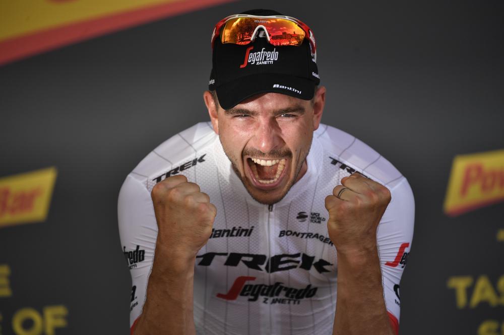 Germany's John Degenkolb celebrates on the podium after winning the ninth stage of the 105th edition of the Tour de France cycling race between Arras and Roubaix, northern France, Sunday. — AFP 