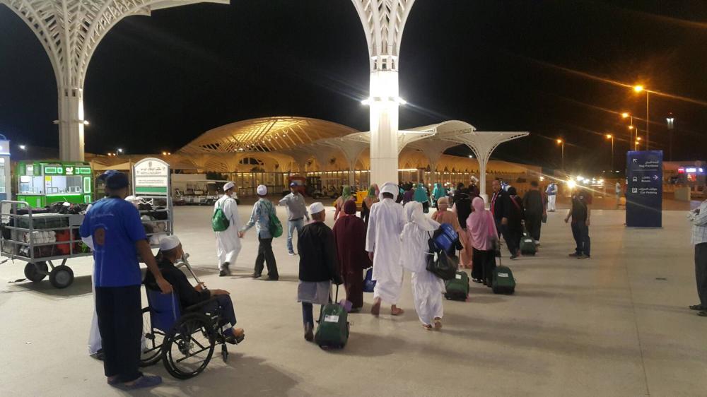 Deputy Interior Minister, Mr. Sutee Makboon (fifth from left), and Shiekhul Islam of Thailand, Mr. Aziz Phitakkumpon (on wheelchair) attended the Blessing Ceremony and seeing off the Thai hajj pilgrims at Hat Yai International airport in Thailand. — Courtesy photos