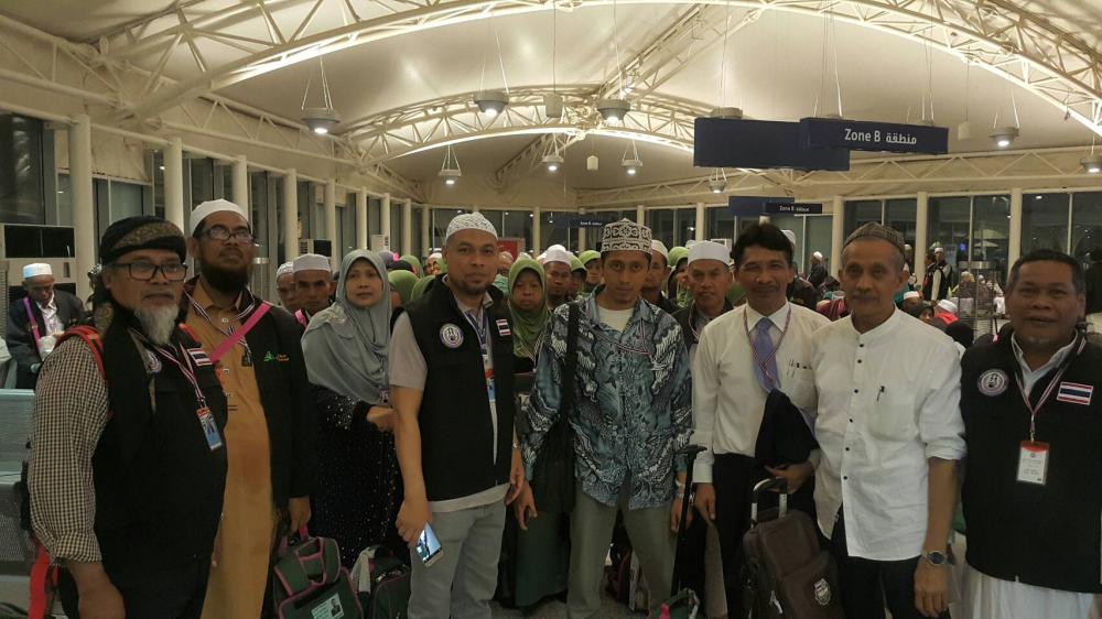 Deputy Interior Minister, Mr. Sutee Makboon (fifth from left), and Shiekhul Islam of Thailand, Mr. Aziz Phitakkumpon (on wheelchair) attended the Blessing Ceremony and seeing off the Thai hajj pilgrims at Hat Yai International airport in Thailand. — Courtesy photos