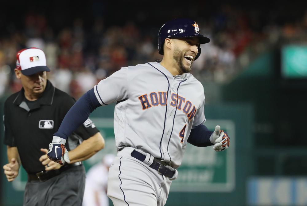 George Springer of the Houston Astros and the American League celebrates while rounding the bases after hitting a solo home run in the tenth inning against the National League during the 89th MLB All-Star Game at Nationals Park in Washington Tuesday. — AFP 