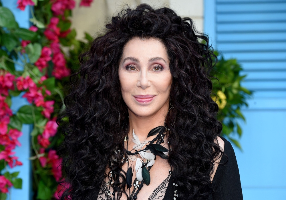 (FILES) In this file photo taken on July 16, 2018 Cher poses on the red carpet upon arrival for the world premiere of the film 