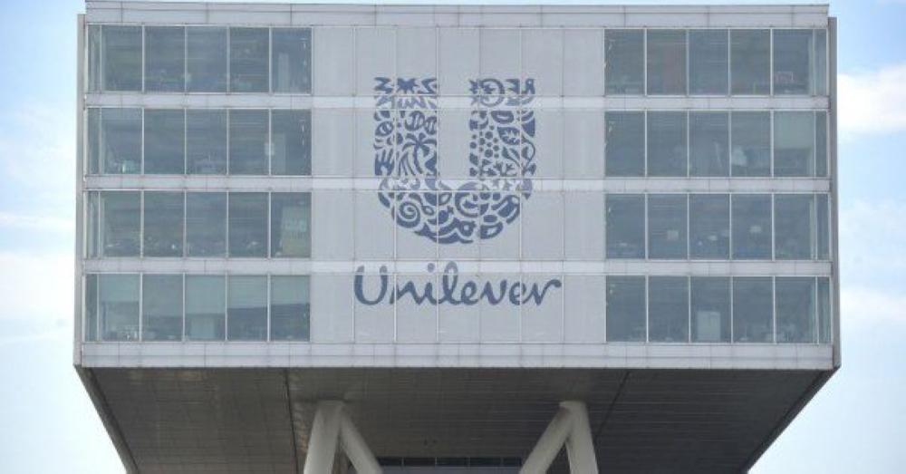 Unilever sales, profits slump as London move looms