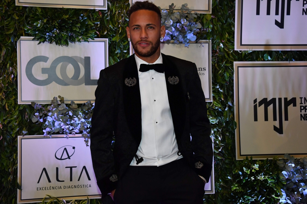 Brazilian PSG's footballer Neymar Junior, arrives to participate in the charity auction of the Neymar Jr. Institute in Sao Paulo, Brazil on Thursday. — AFP