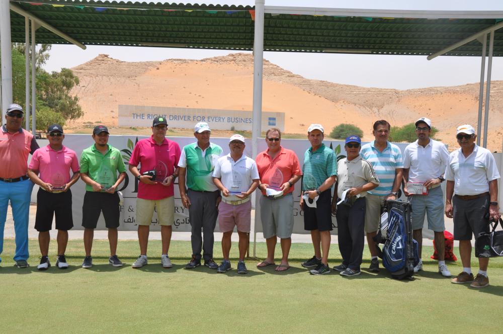 The winners posing with their prizes.  