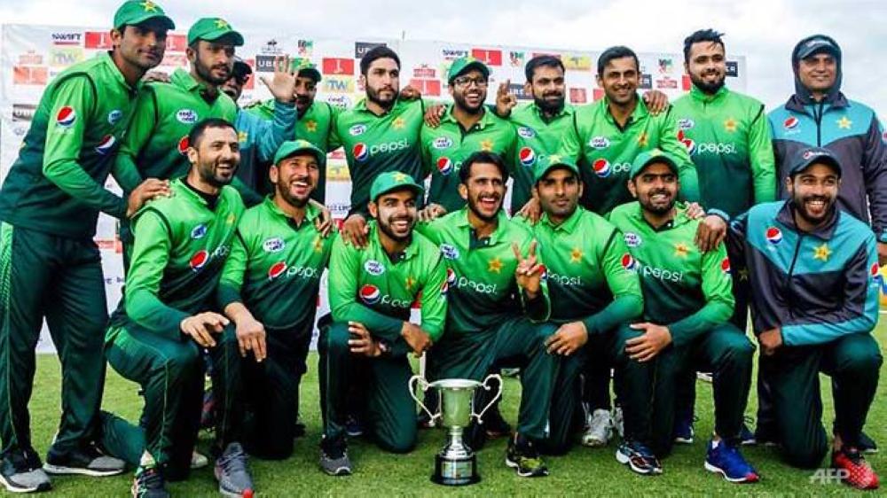 Pakistan players pose with the trophy, after sweeping Zimbabwe in the One-Day International series in Bulawayo Sunday. — AFP