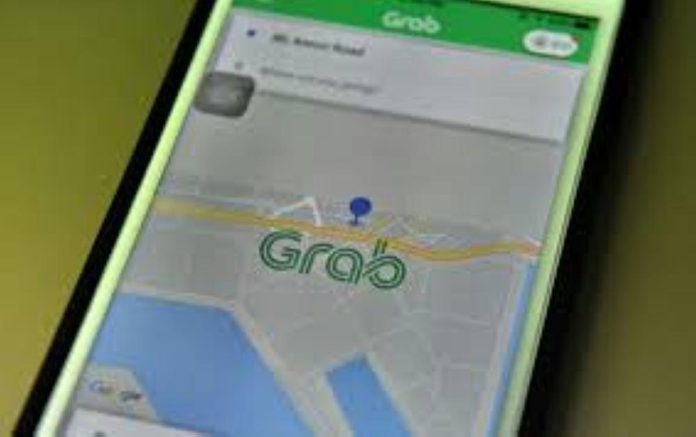 Ride-hailing firm Grab hits back in Uber takeover row