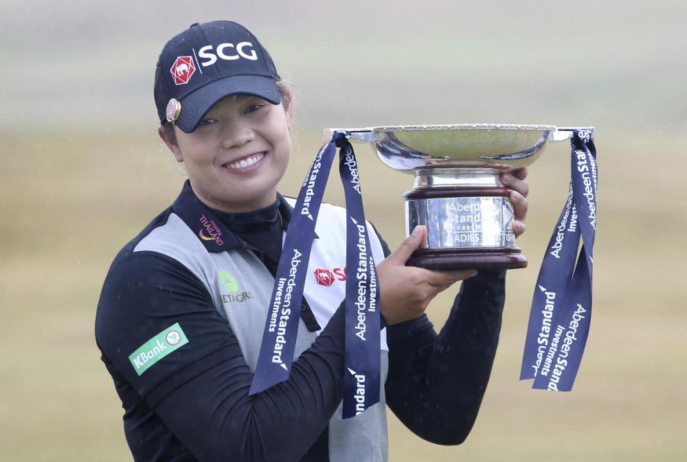 Ariya Jutanugarn holds the Scottish Open Trophy. — AFP