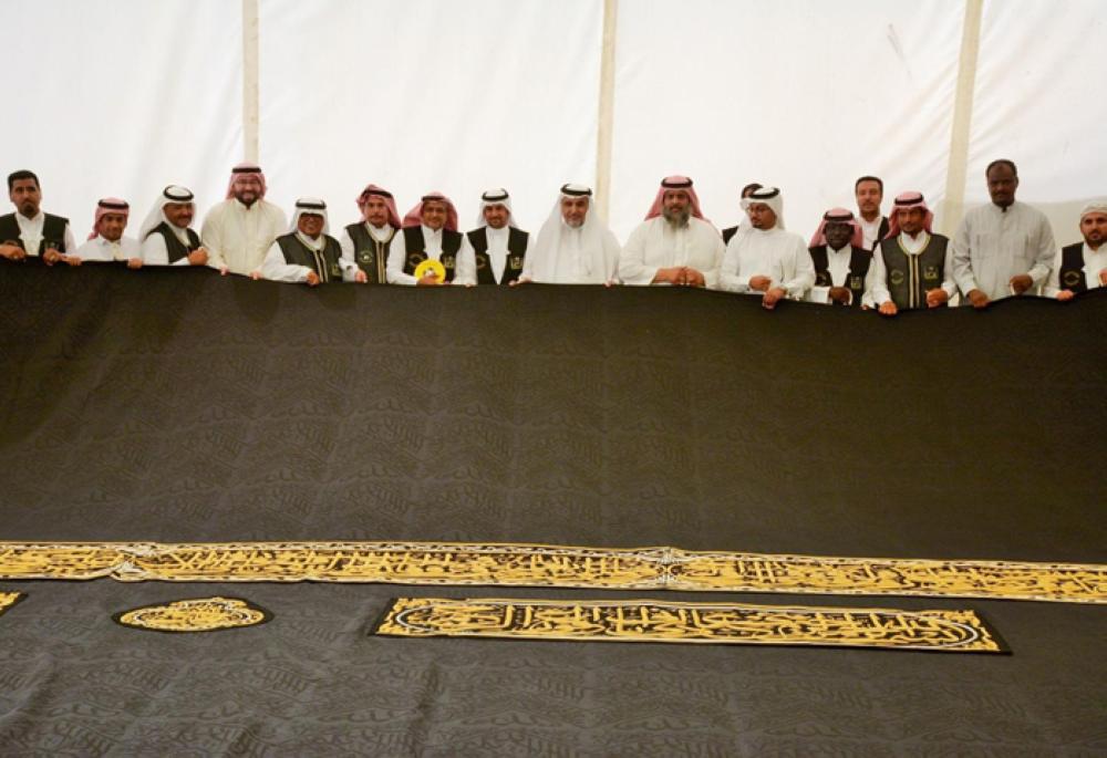 Members of the Committee for Inspecting the Holy Kaaba Cloth check the Kiswa at the King Abdul Aziz Complex for the Kaaba Kiswa in Makkah on Sunday. — SPA