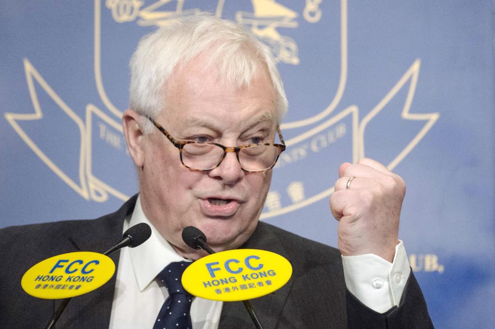 In this file picture, Hong Kong's former British colonial governor Chris Patten gestures as he speaks at the Foreign Correspondents Club in Hong Kong. Former British governor of Hong Kong Chris Patten said it was 