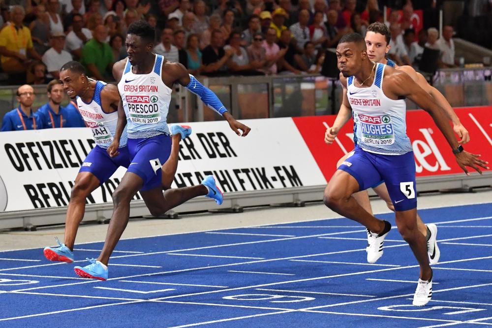 Great Britain’s Zharnel Hughes (R) finishes ahead of countrymen Reece Prescod (2nd L) and Chijindu Ujah in the 100m final of the European Athletics Championships at the Olympic Stadium in Berlin Tuesday. — AFP 