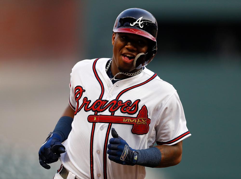 Ronald Acuna Jr. of the Atlanta Braves hits a solo homer to lead off Game Two of a doubleheader against the Miami Marlins at SunTrust Park in Atlanta Monday. — AFP 
