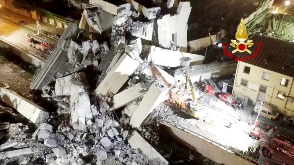 A motorway bridge which collapsed on Tuesday near the northern Italian port city of Genoa is seen in this still image taken from a video released by Italian firefighters on Tuesday.  — Reuters