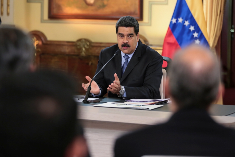 Venezuelan President Nicolas Maduro speaks during a meeting with ministers at Miraflores Palace in Caracas, Venezuela, on Friday. — Reuters