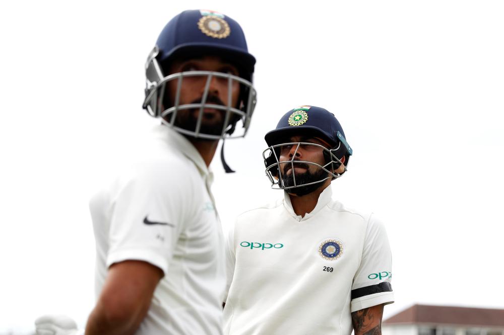 India's Virat Kohli and Ajinkya Rahane pose during the first day of the third cricket Test against England at Trent Bridge, Nottingham, Saturday. — Reuters