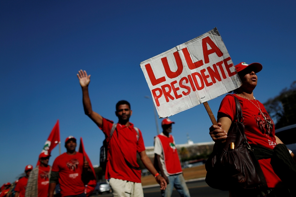 Former Brazilian President Luiz Inacio Lula da Silva’s supporters walk during the Free Lula March in Brasilia, Brazil, in this Aug. 14, 2018 file photo. — Reuters