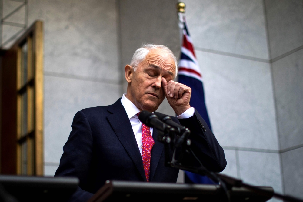 Australian Prime Minister Malcolm Turnbull gestures as he takes part in a press conference in Canberra on Tuesday. — AFP