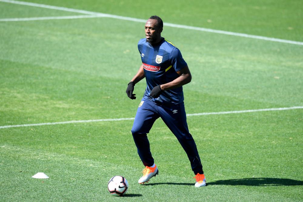 Eight-time Olympic sprinting gold medalist Usain Bolt takes part in his first training session with the Central Coast Mariners at Central Coast Stadium in Gosford, Australia, Tuesday. — Reuters