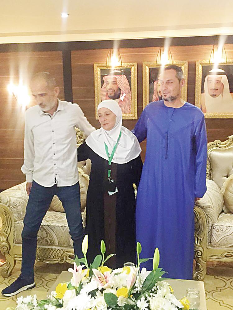 Musa and Latifa, two Palestinian siblings, united in Hajj seen with Bassam— Okaz/SG photo