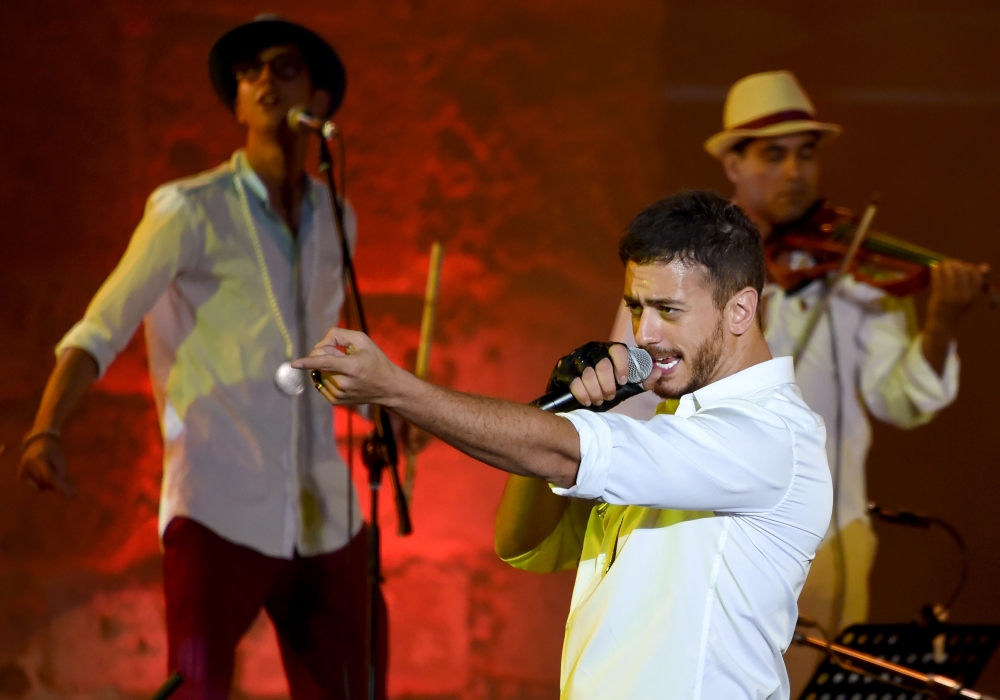 Moroccan singer Saad Lamjarred performs during the 52nd International Carthage Festival at the Roman Theatre of Carthage, near Tunis, in this file photo taken on July 31, 2016. - AFP