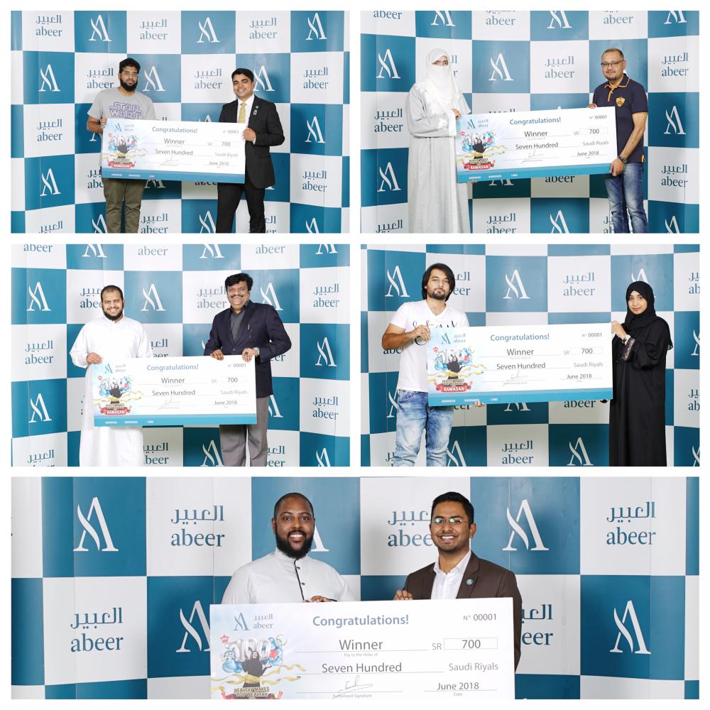 Winners of ‘Healthy Makes You Wealthy’ weight loss campaign receiving their cash awards from Abeer Management. — Courtesy photo
