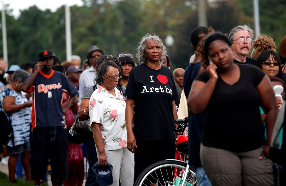 People wait in line outside the Charles H. Wright Museum of African American History where the late singer Aretha Franklin will lie in state for two days of public viewing in Detroit, Michigan on Wednesday. - Reuters