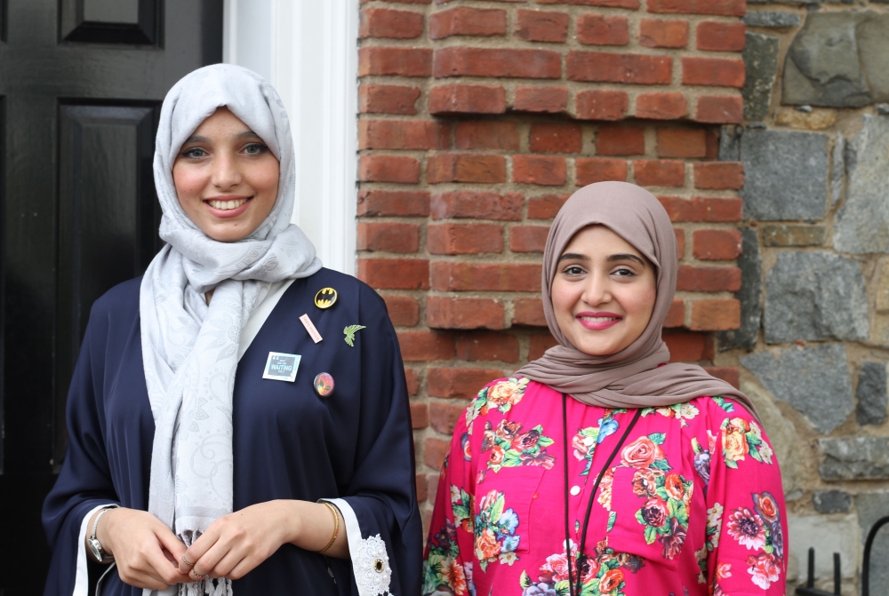 Saudi entrepreneurs Asmaa Alabdallah (L), founder of BitGo, and Reem Dad (R), co-founder of Taibah VR, stand in front of Halcyon House in Washington. Young Saudi women social entrepreneurs attend an intensive program at Halcyon, a Washington-based business incubator, to turn their ideas into reality. — AFP