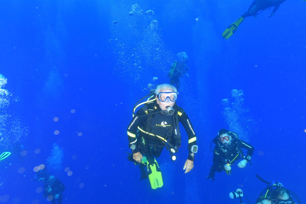 Ray Woolley, pioneer diver and World War II veteran, swims over the Zenobia wreck, off the Cypriot town of Larnaca, Cyprus on Sunday. - Reuters
