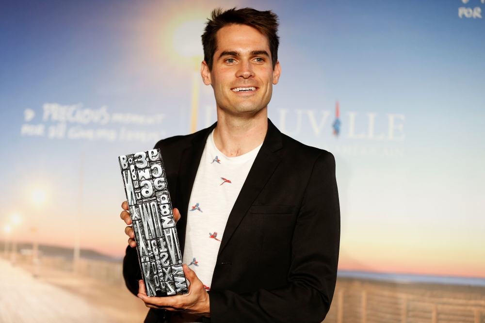 Actor and director Jim Cummings celebrates after winning the Grand Prize at the 44th Deauville American Film Festival in Deauville, north western France, on Sunday. - AFP