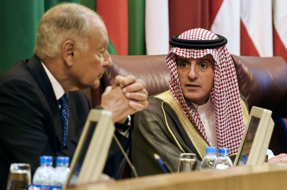 

Arab League Secretary-General Ahmed Aboul Gheit (L) speaks with Saudi Foreign Minister Adel Al-Jubeir during a League meeting at its headquarters in the Egyptian capital Cairo on Tuesday. — AFP