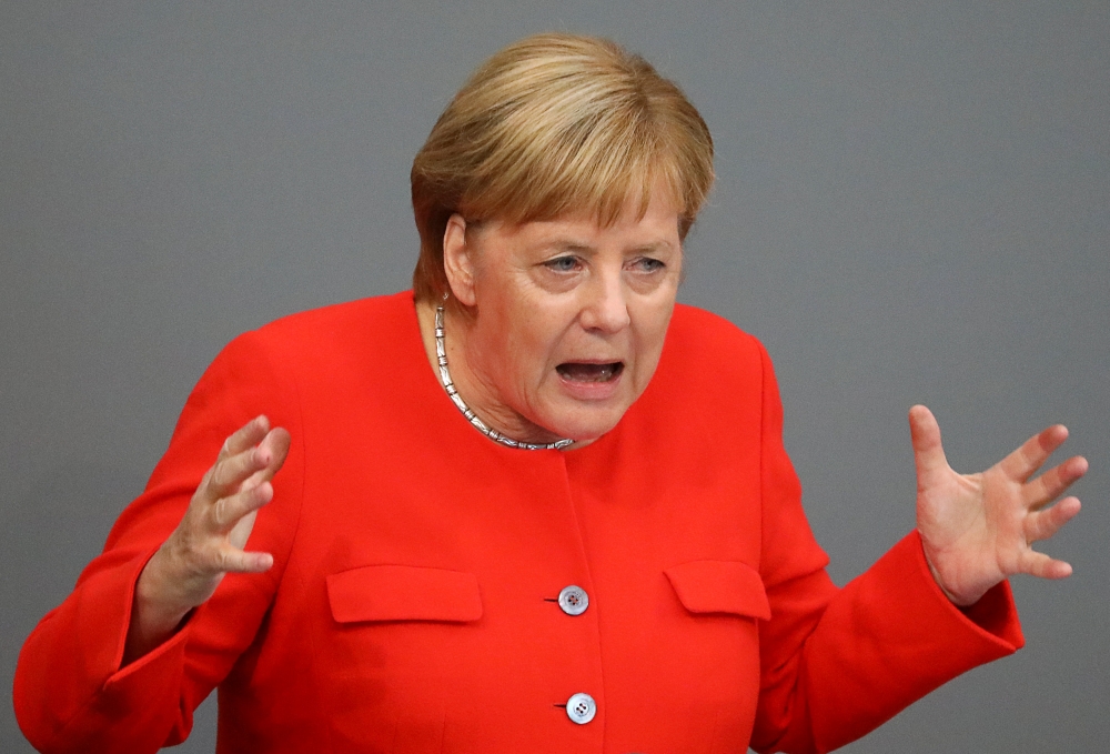 German Chancellor Angela Merkel speaks during a session at the lower house of parliament Bundestag in Berlin on Wednesday. — Reuters