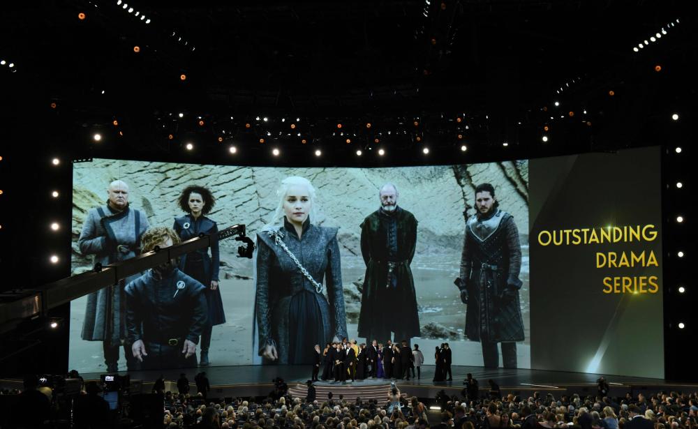 


The cast of “Game of Thrones” is seen on stage as they receive the Emmy for Outstanding Drama Series during the 70th Emmy Awards at the Microsoft Theatre in Los Angeles, California on Tuesday. - AFP