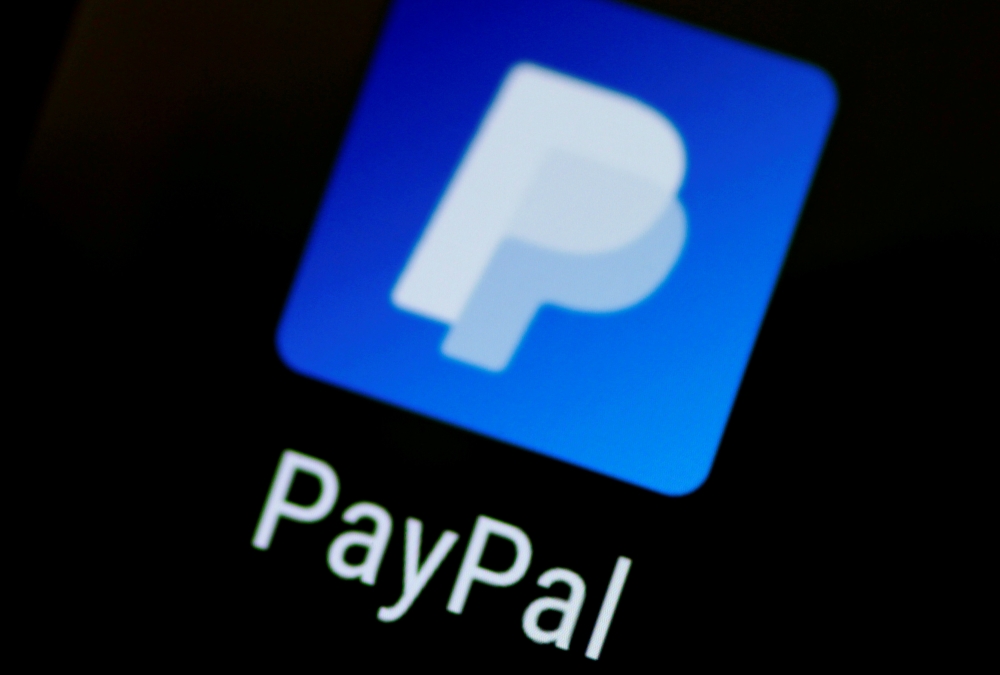 The PayPal app logo seen on a mobile phone in this illustration photo in this Oct. 16, 2017 file photo. — Reuters
