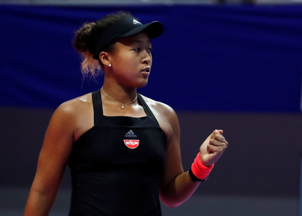 Naomi Osaka of Japan reacts during her match against Camila Giorgi of Italy at the Pan Pacific Open in Tokyo Saturday. — Reuters