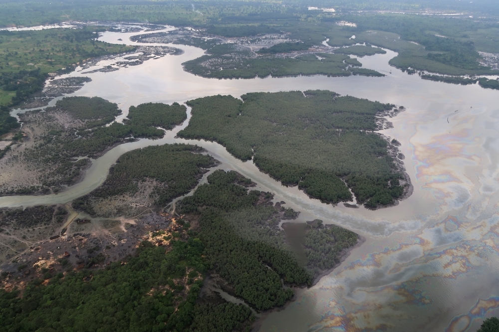 


An overview of the Niger delta where signs of oil spills can be seen in the water in Port Harcourt, Nigeria. — Reuters