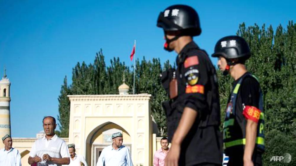 


Chinese police patrol outside a mosque in Kashgar, Xinjiang in this file photo. — AFP