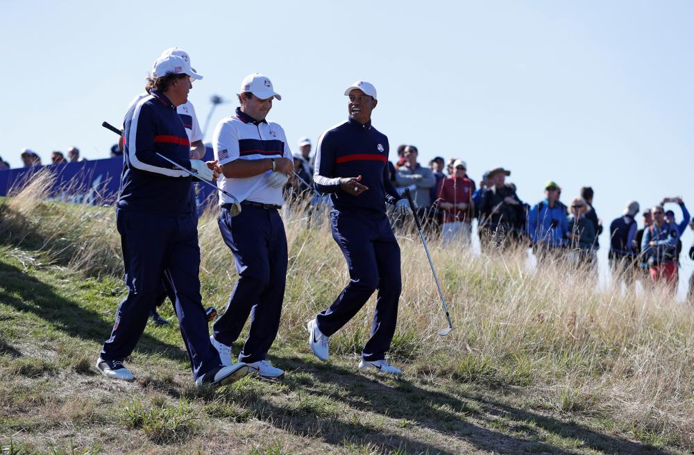 


Team USA’s Phil Mickelson, Patrick Reed and Tiger Woods during practice at Le Golf National - Guyancourt, France Monday. — Reuters