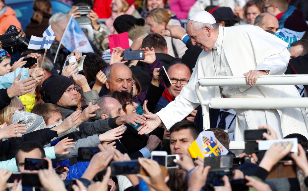 Pope Francis greets faithfuls in Tallinn, Estonia, on Tuesday. — Reuters