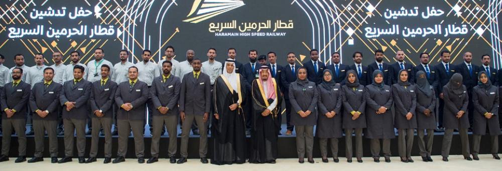


Custodian of the Two Holy Mosques King Salman with the Saudi staff of the Haramain Express Train. — SPA