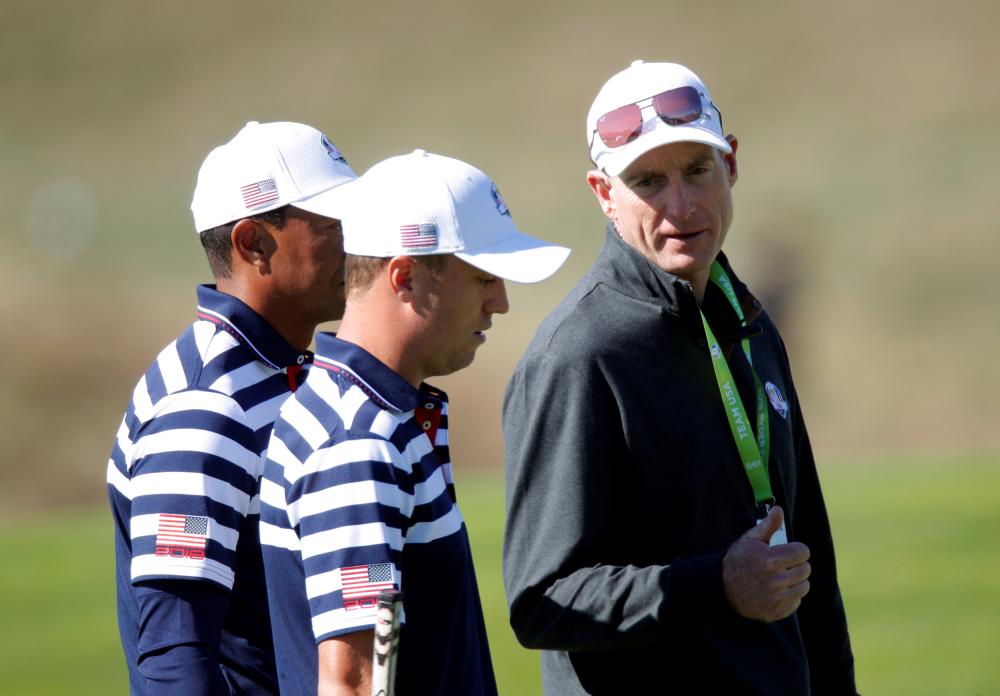 


Team USA’s Tiger Woods, Justin Thomas and captain Jim Furyk during practice at Le Golf National - Guyancourt, France Wednesday. — Reuters