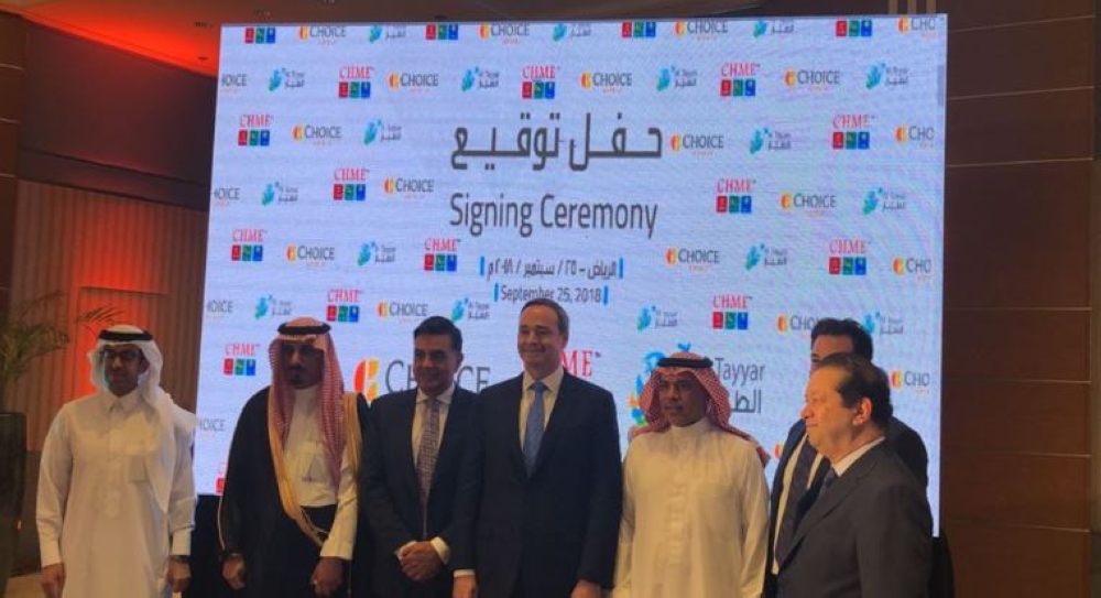 



Officials of signatory companies pose for a group photo